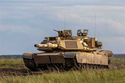 Ukraine reinforces US Abrams tanks with steel cages .